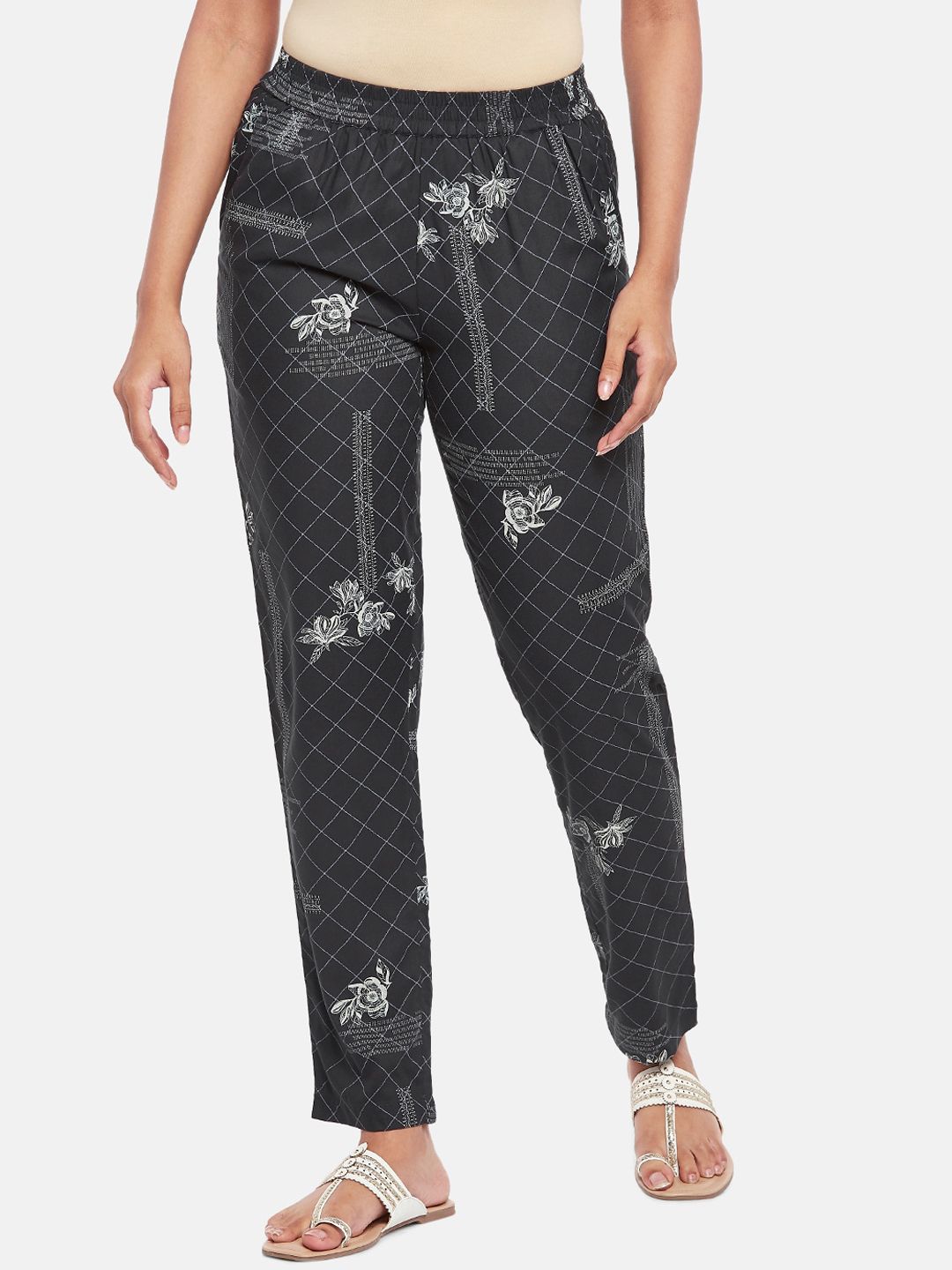 AKKRITI BY PANTALOONS Women Black & White Floral Printed Trousers Price in India
