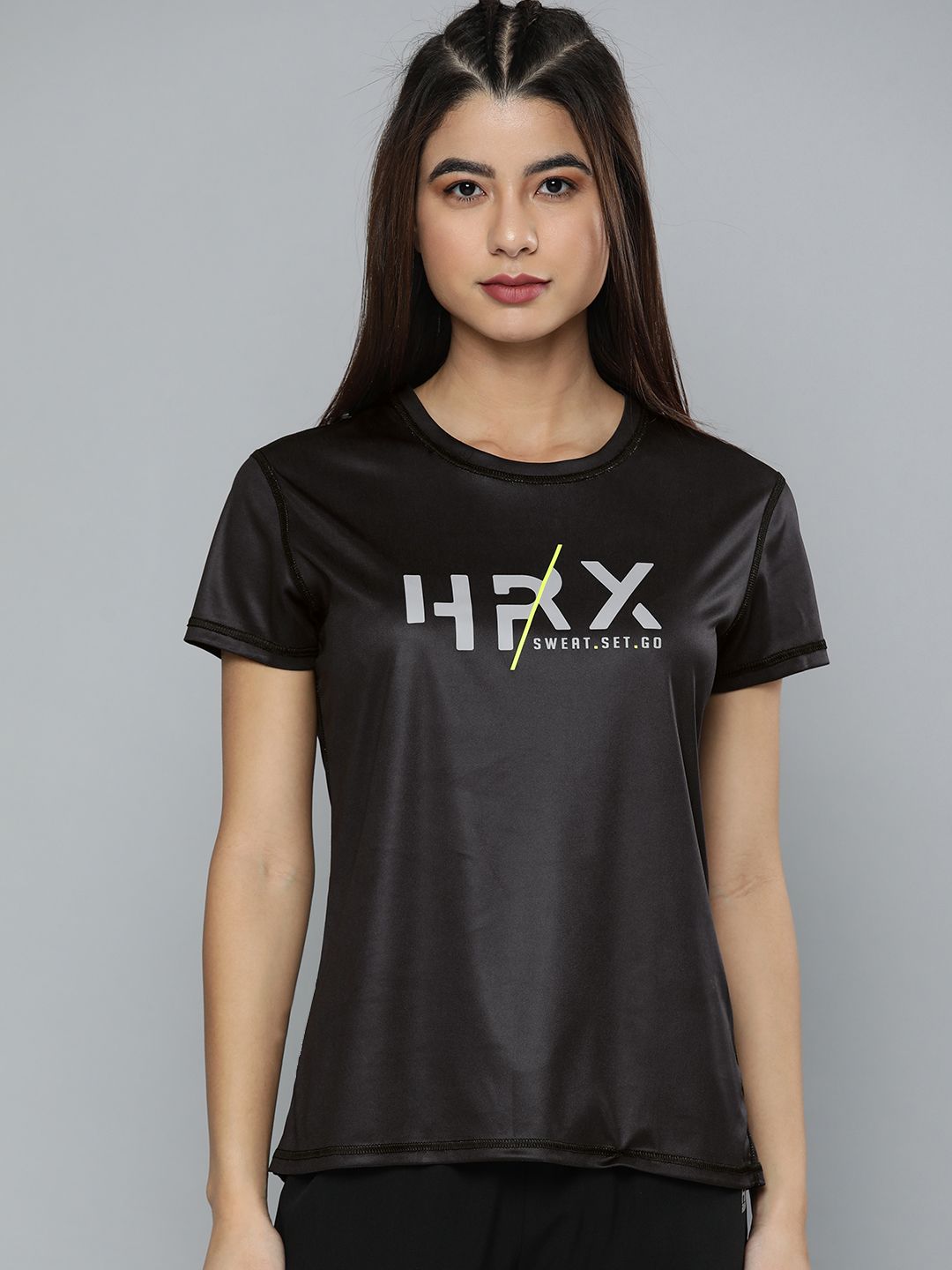 HRX By Hrithik Roshan Training Women Black Reversible AOP Tshirts Price in India