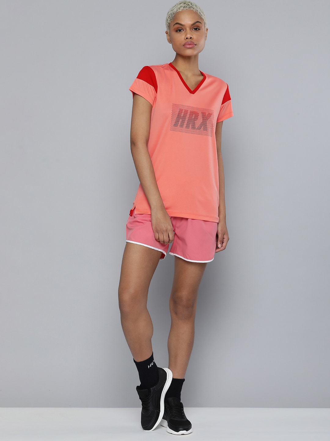 HRX By Hrithik Roshan Women Salmon Rose Rapid-Dry Brand Carrier  Football Tshirts Price in India