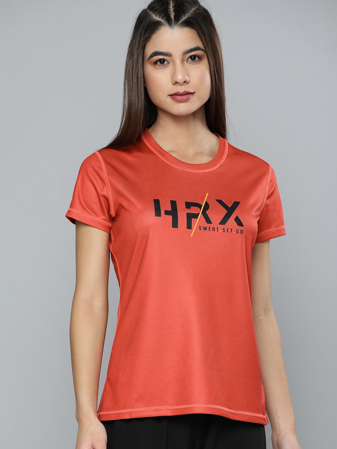 HRX By Hrithik Roshan Training Women Coral Red Reversible AOP Tshirts Price in India
