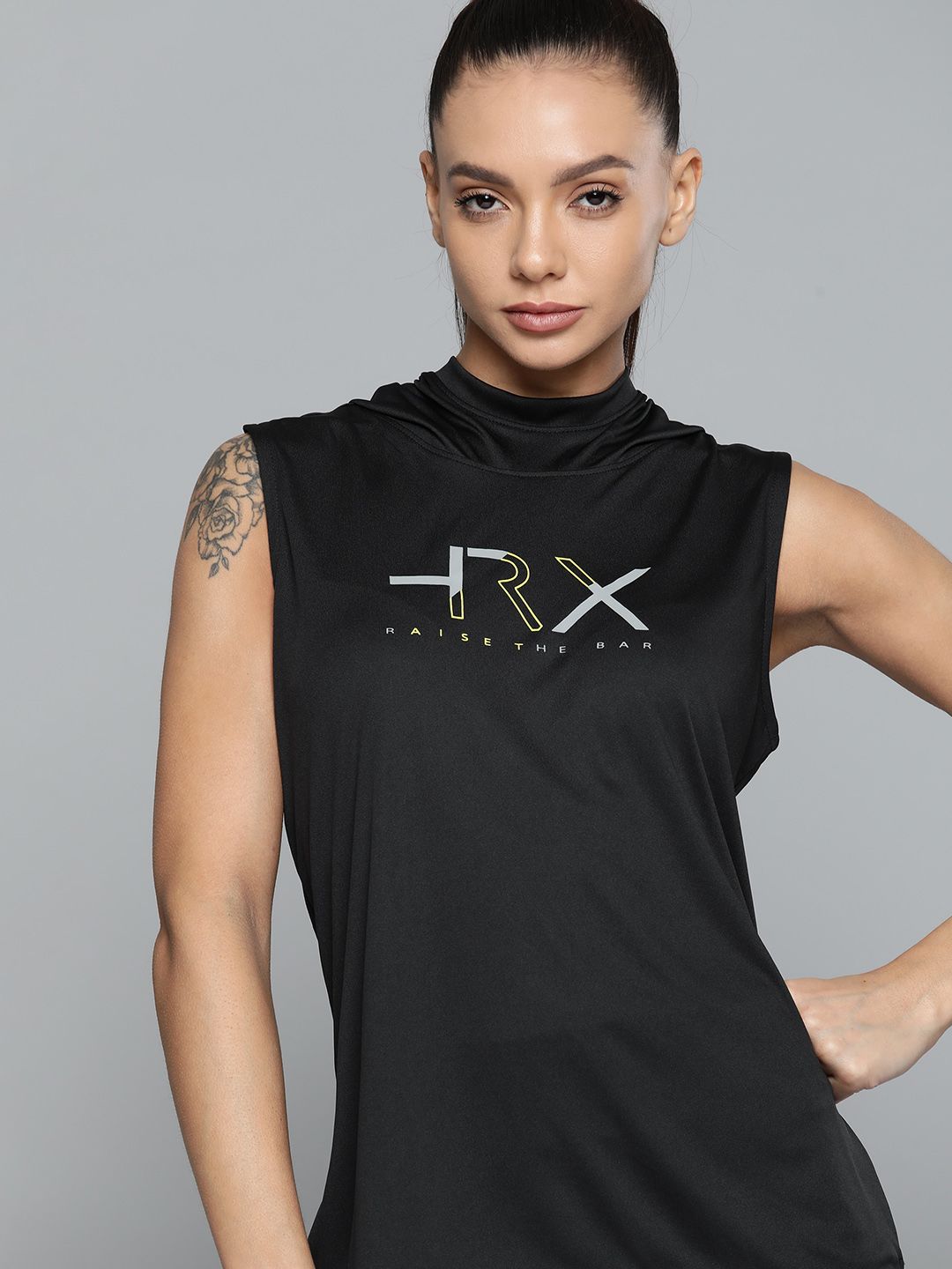 HRX By Hrithik Roshan Training Women Jet Black Rapid-Dry Brand Carrier Tshirt Price in India