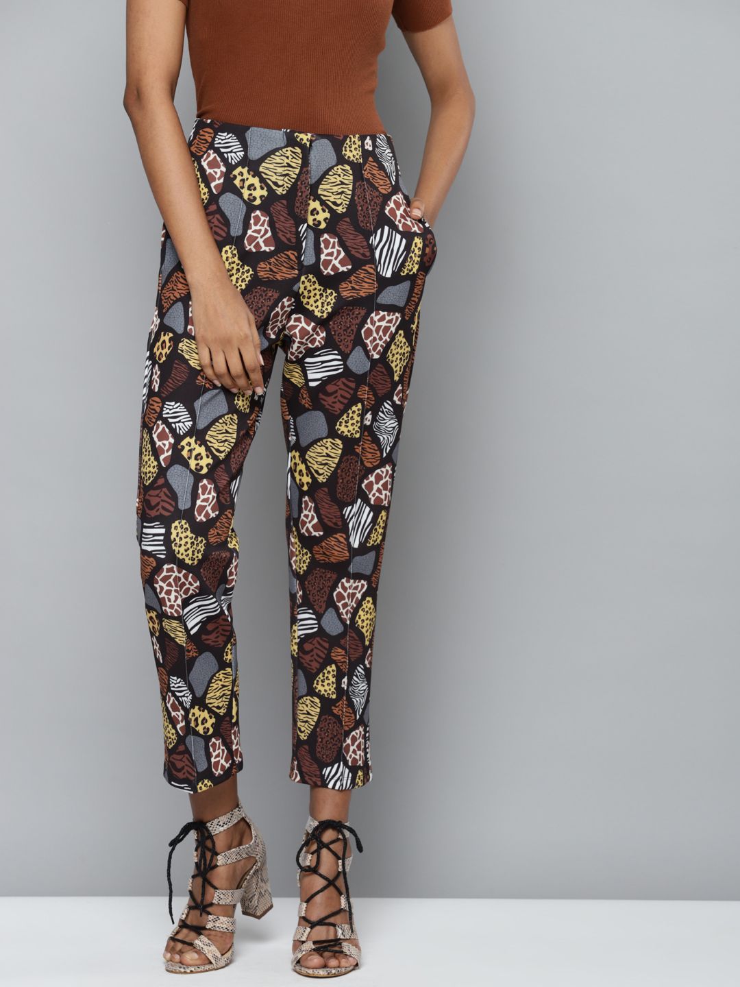 SASSAFRAS Women Multicoloured Animal Printed Tapered Fit High-Rise Trousers Price in India