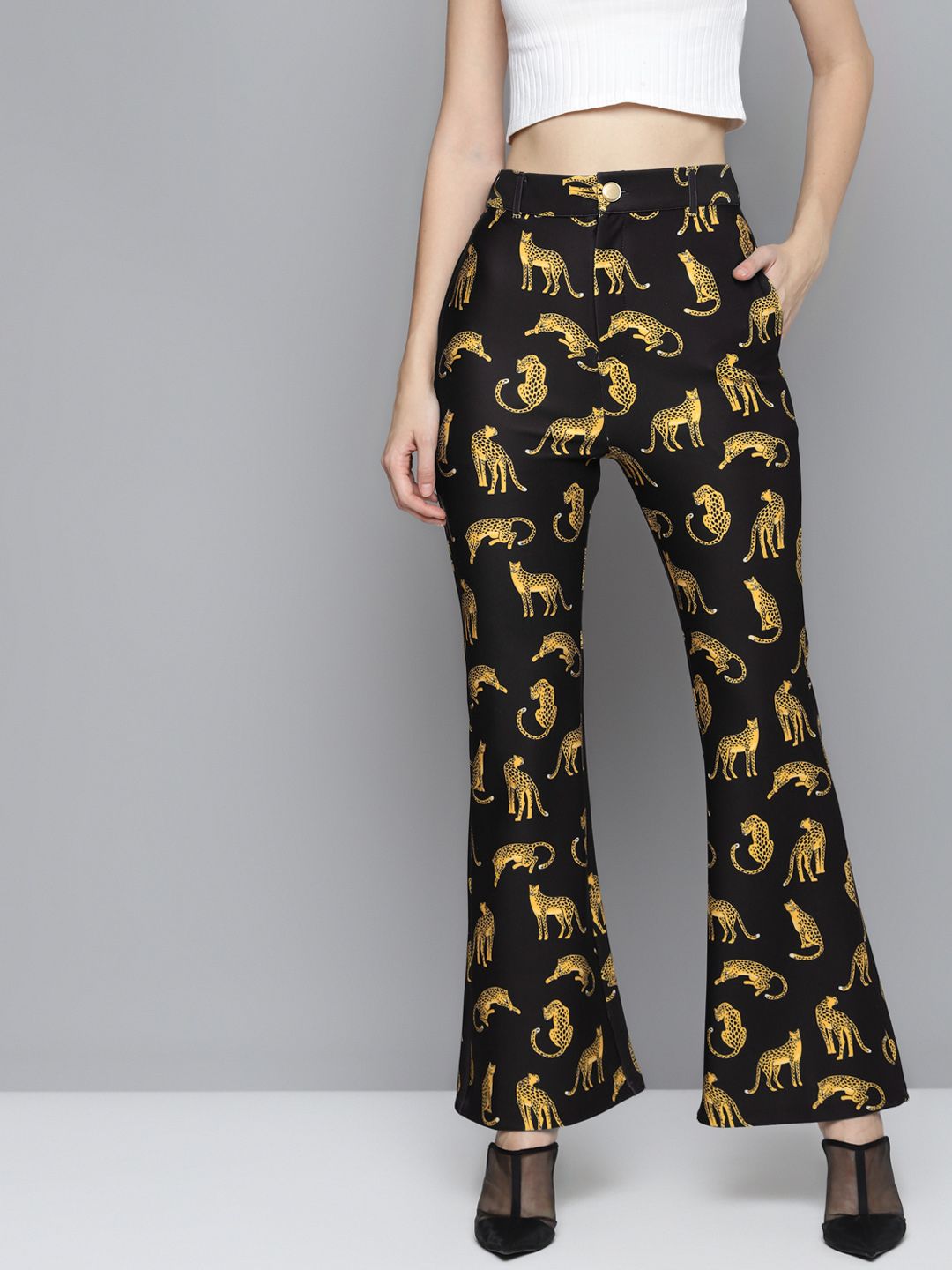 SASSAFRAS Women Black & Mustard Yellow Cheetah Printed Slim Fit Scuba Bell Bottom Pants Price in India