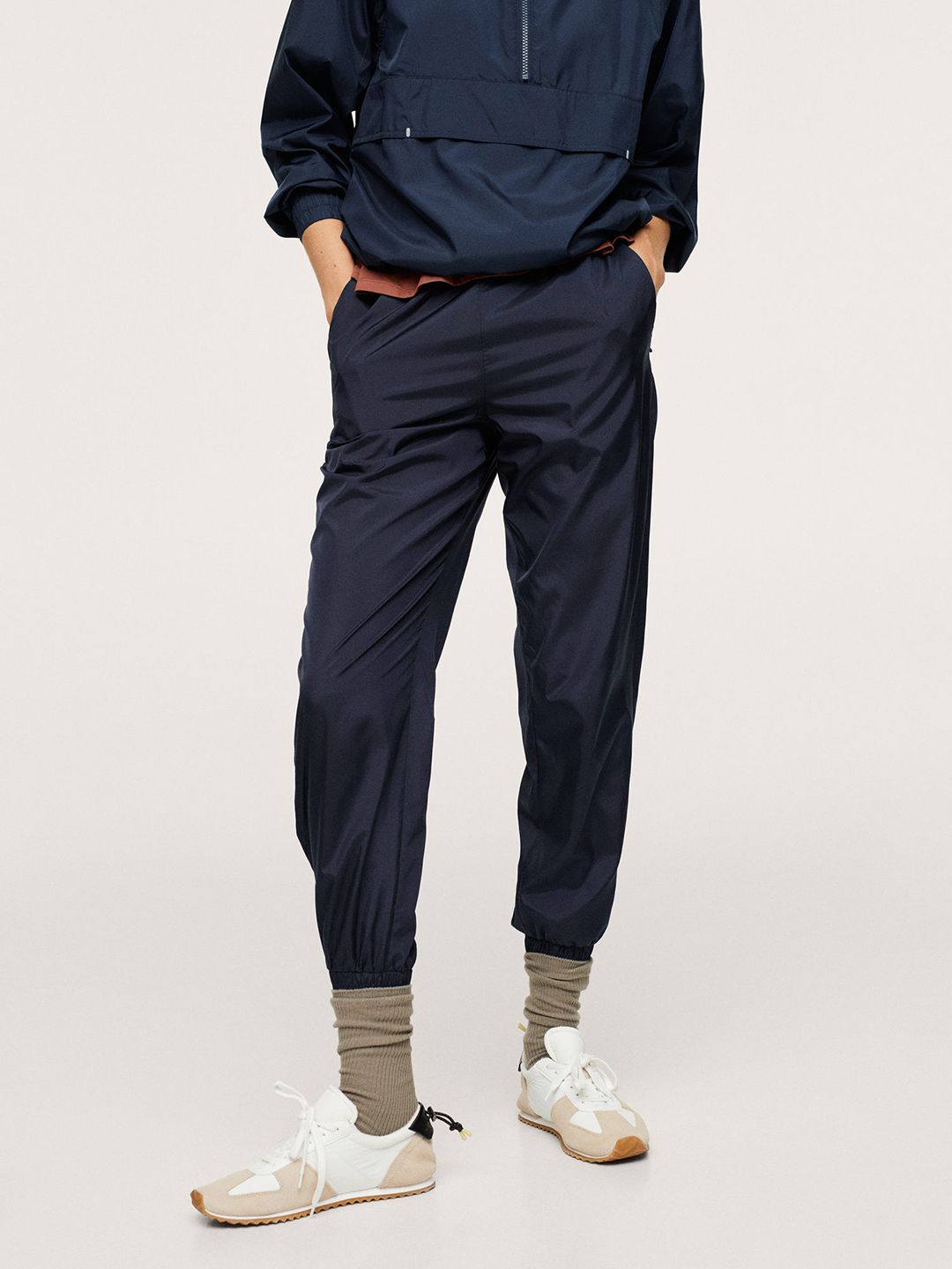 MANGO Women Navy Blue Solid Waterproof Joggers Price in India