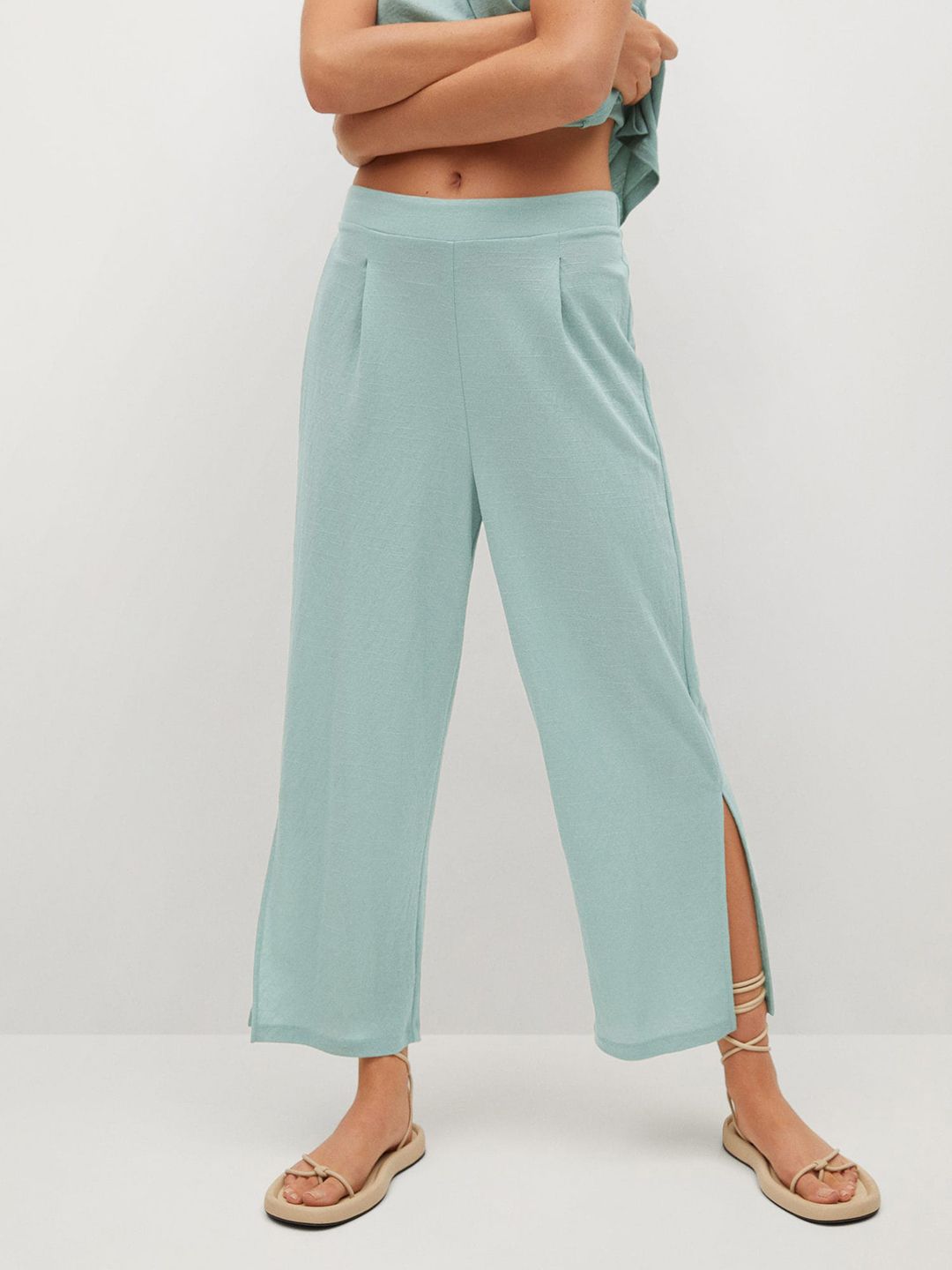 MANGO Women Blue Solid Side Slits Trousers Price in India