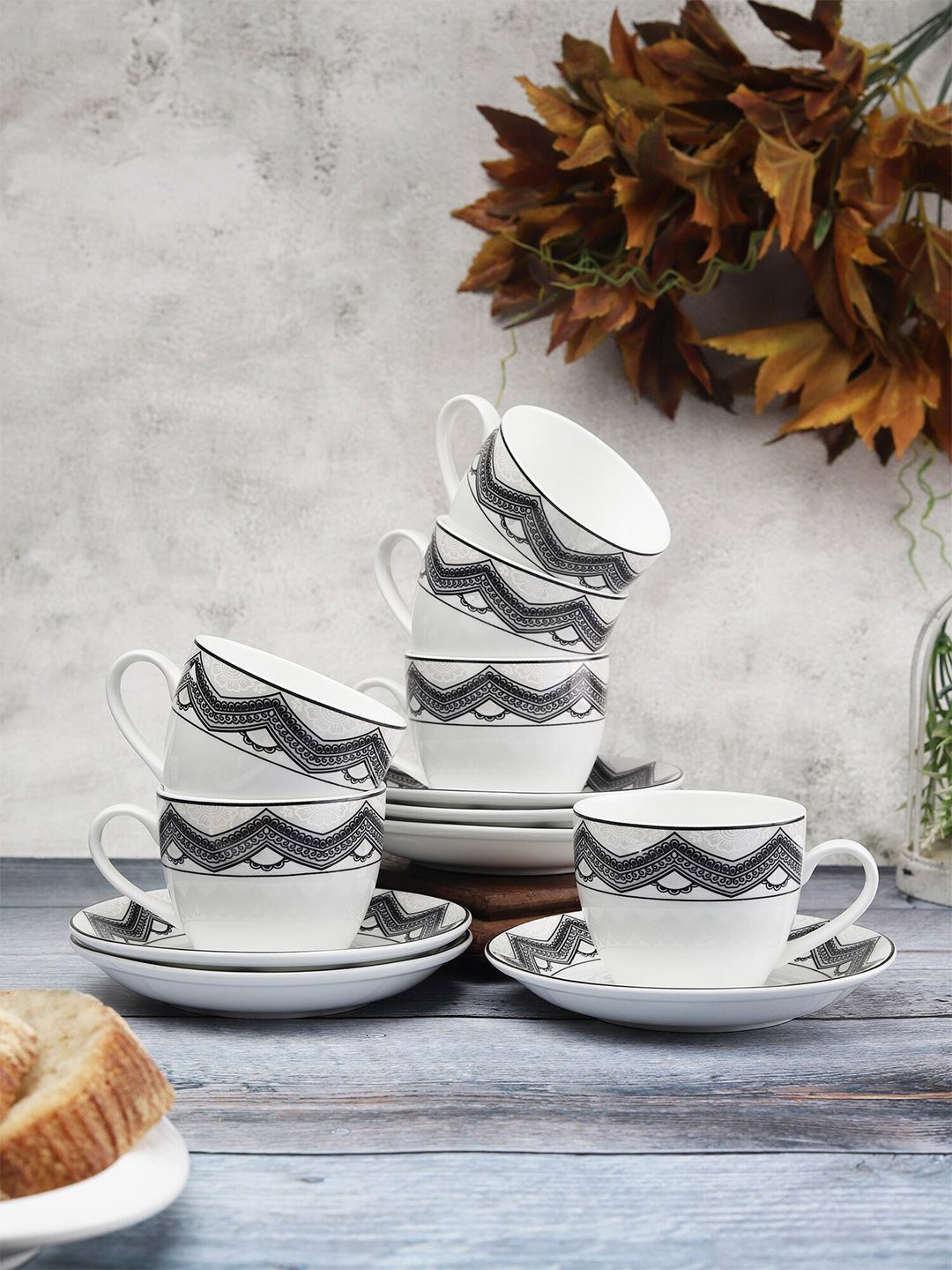 CLAY CRAFT Set of 12 White & Black Floral Printed Ceramic Glossy Cups and Saucers Price in India