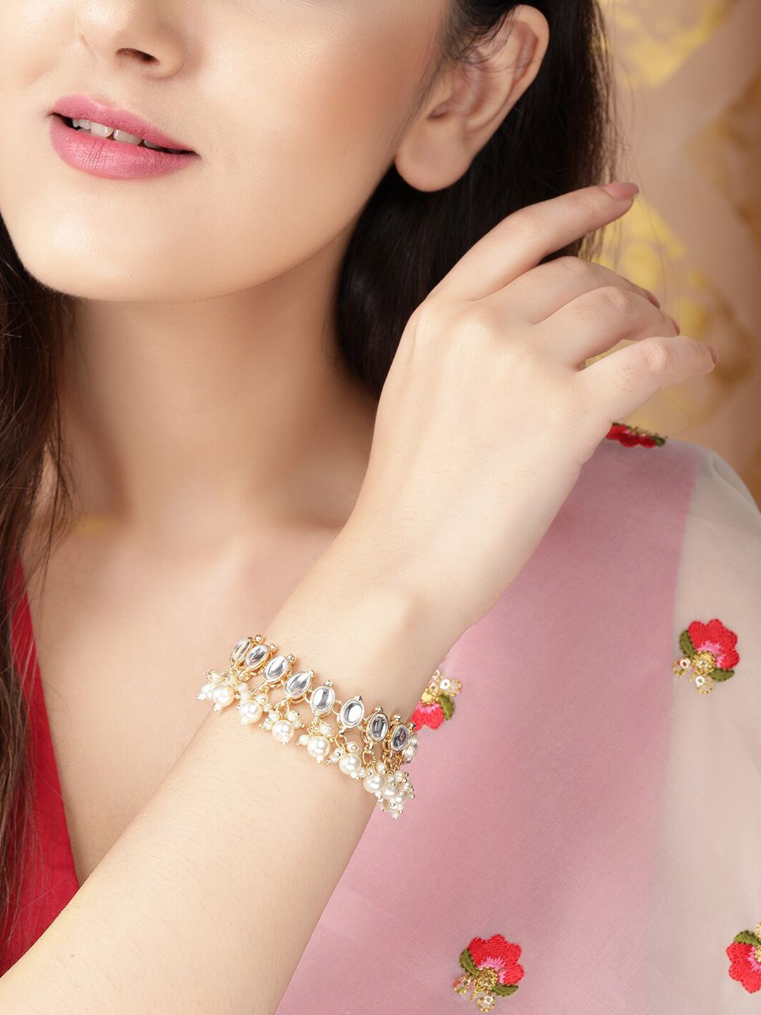 Rubans Women Gold-Toned Handcrafted Kundan Studded & Pearls Beaded Bracelet Price in India