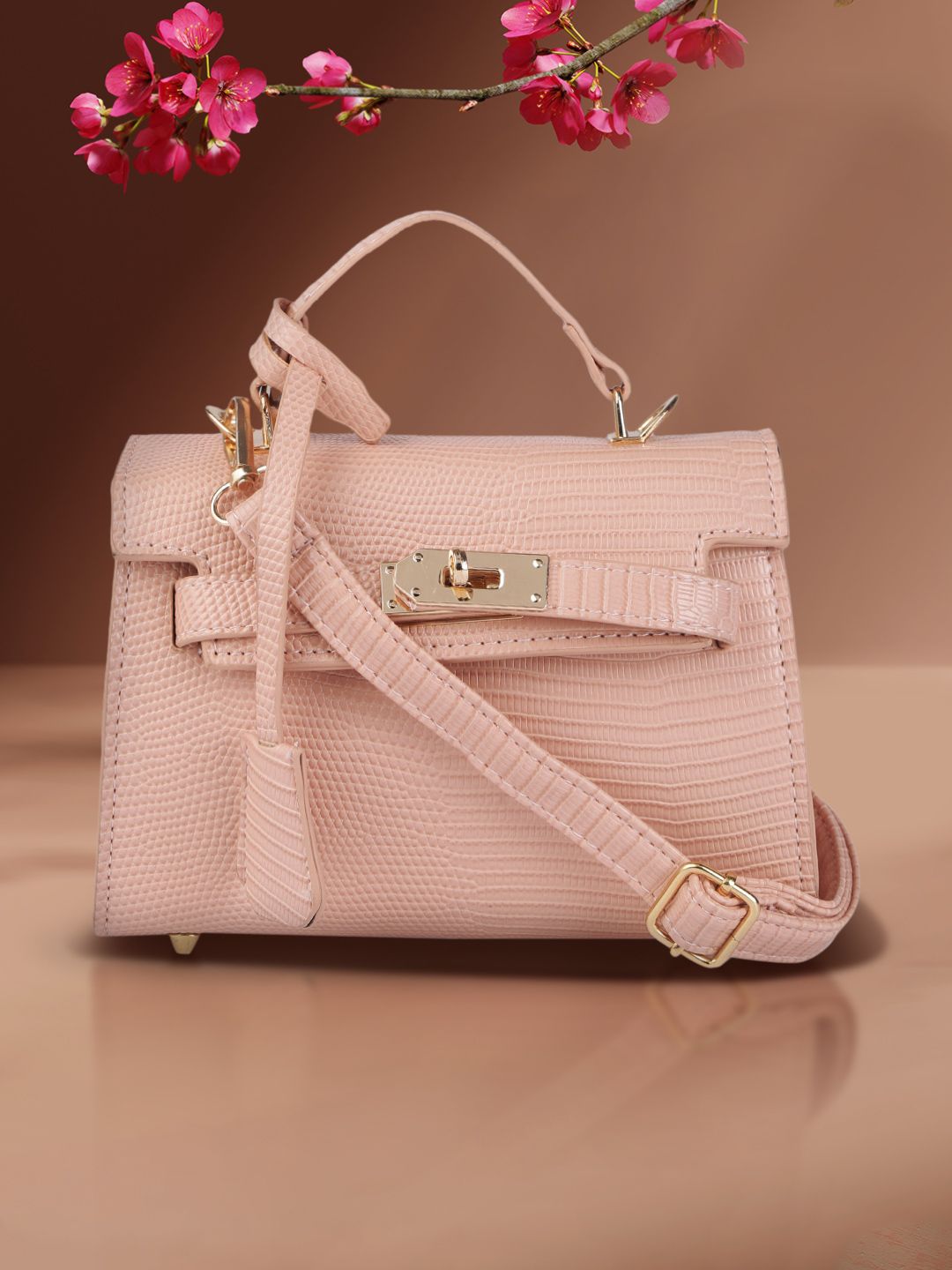 DressBerry Pink Animal Textured Structured Satchel Price in India