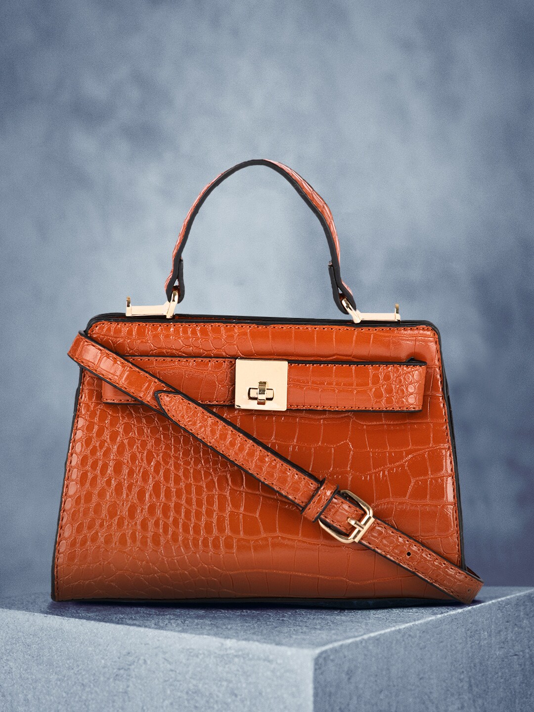 Mast & Harbour Tan Animal Textured PU Regular Structured Handheld Bag with Buckle Detail Price in India