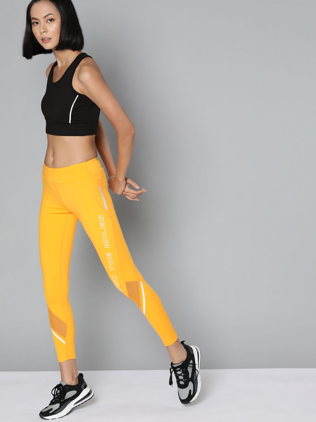 HRX By Hrithik Roshan Women Yellow Typography Printed Rapid-Dry Running Tights Price in India