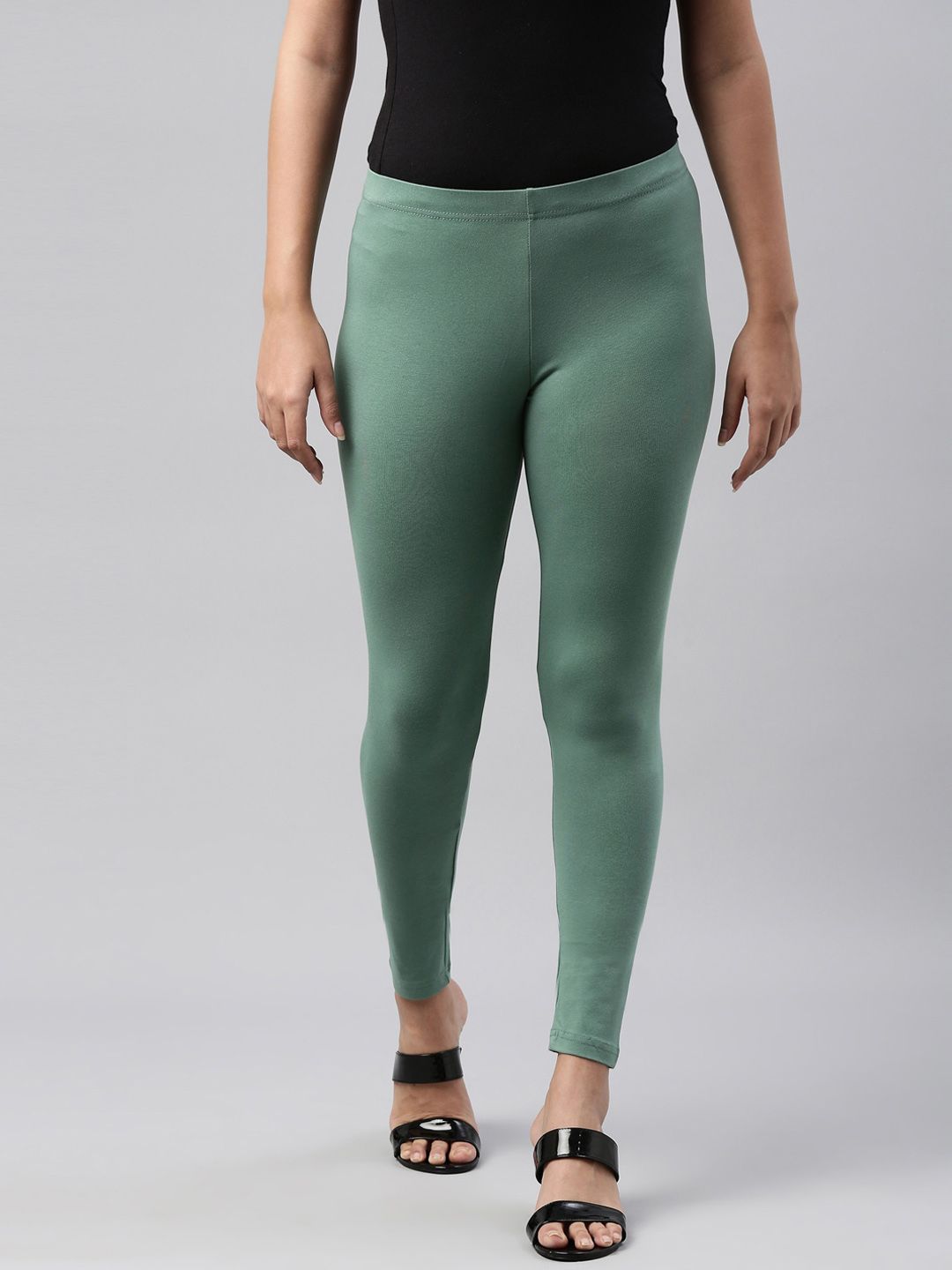 Go Colors Women Green Solid Ankle-Length Leggings Price in India