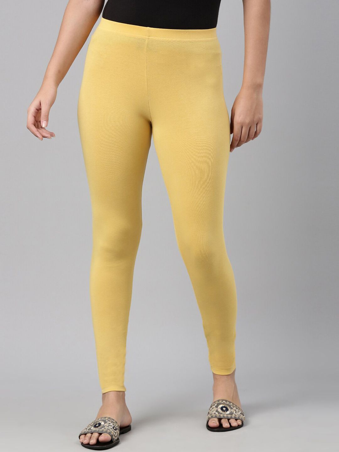 Go Colors Women Yellow Solid Ankle-Length Leggings Price in India