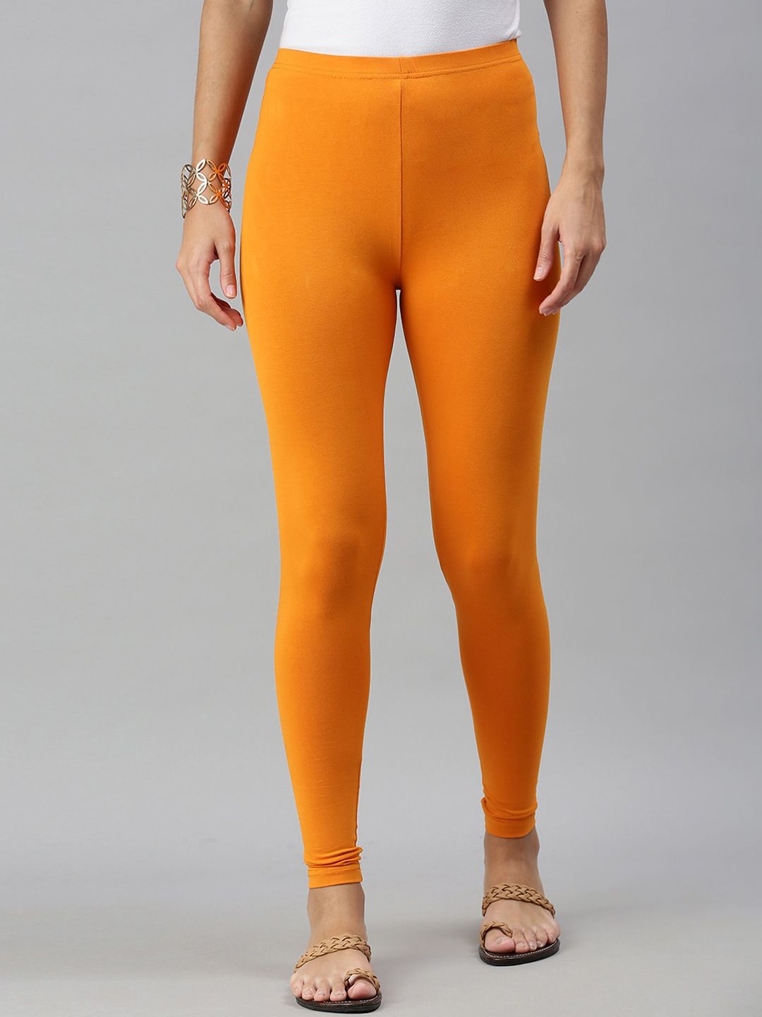 De Moza Women Orange Solid Churidhar-Length Leggings Price in India