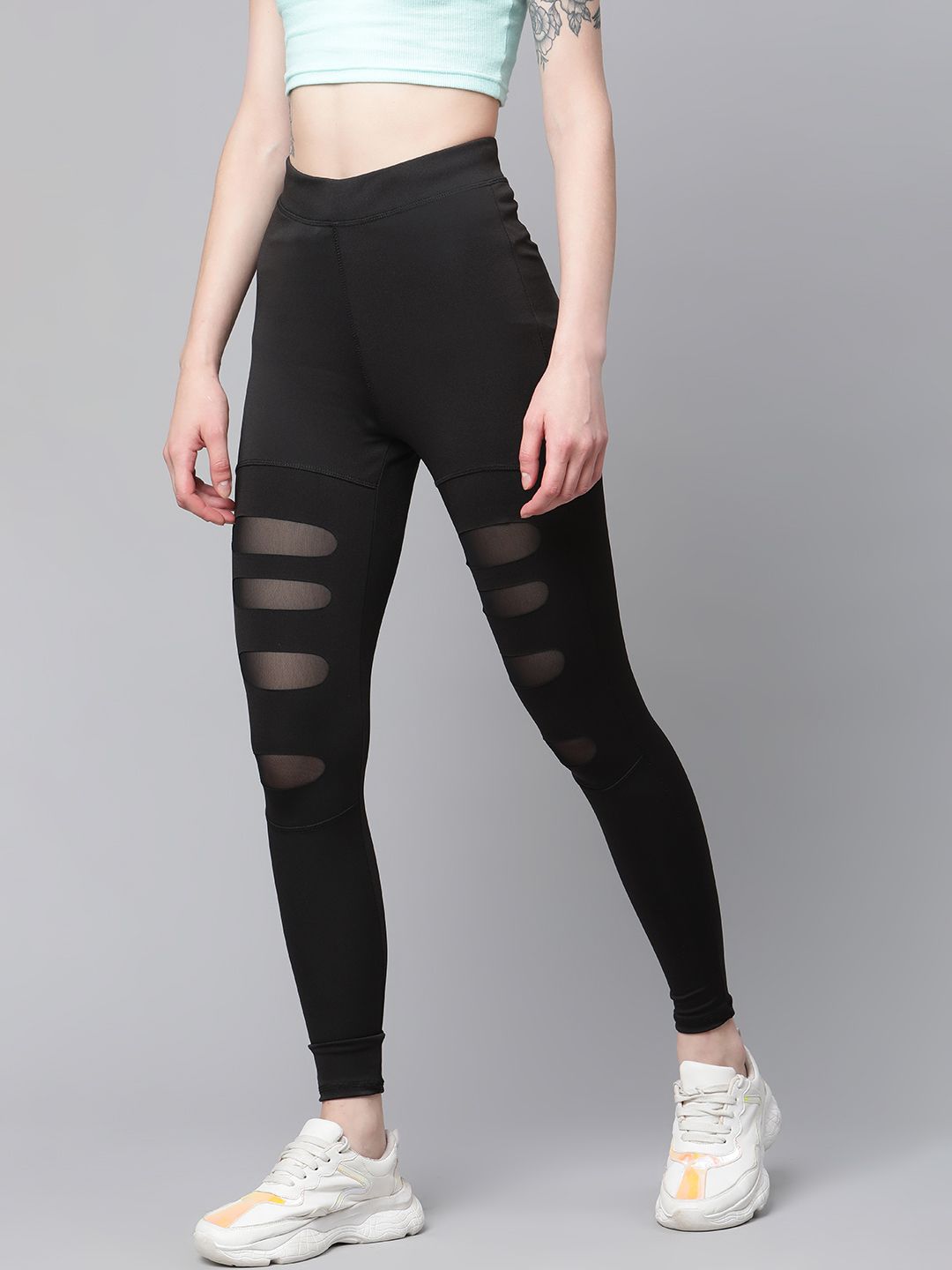 Blinkin Women Black Solid Mesh Inserts Semi-Sheer Gym Tights Price in India