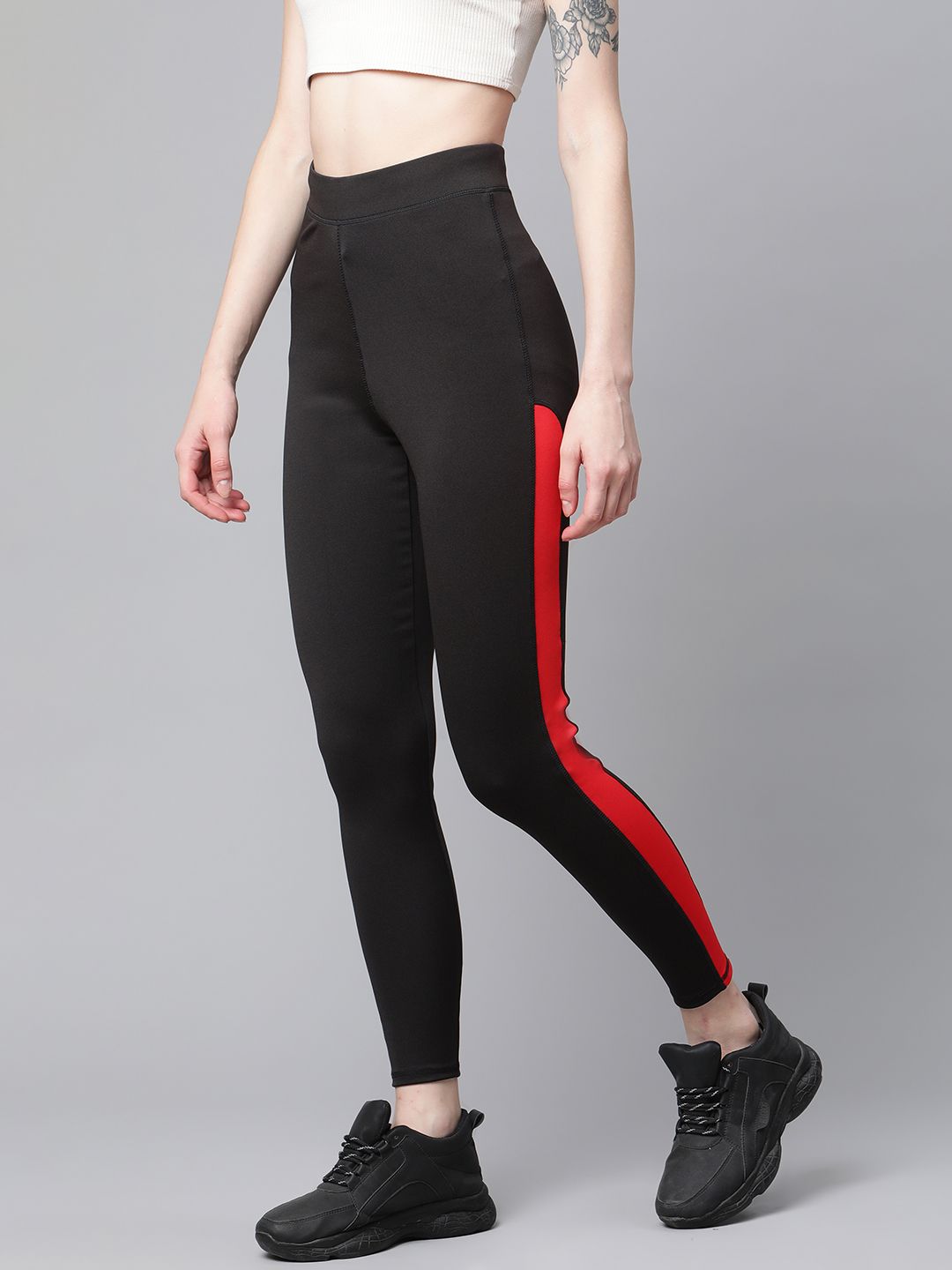 Blinkin Women Black & Red Solid High-Rise Tights with Side Taping Price in India
