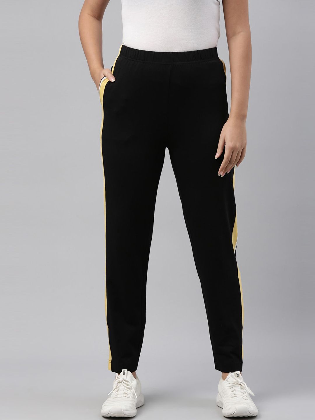 Go Colors Women Black Solid Relaxed-Fit Track Pants Price in India