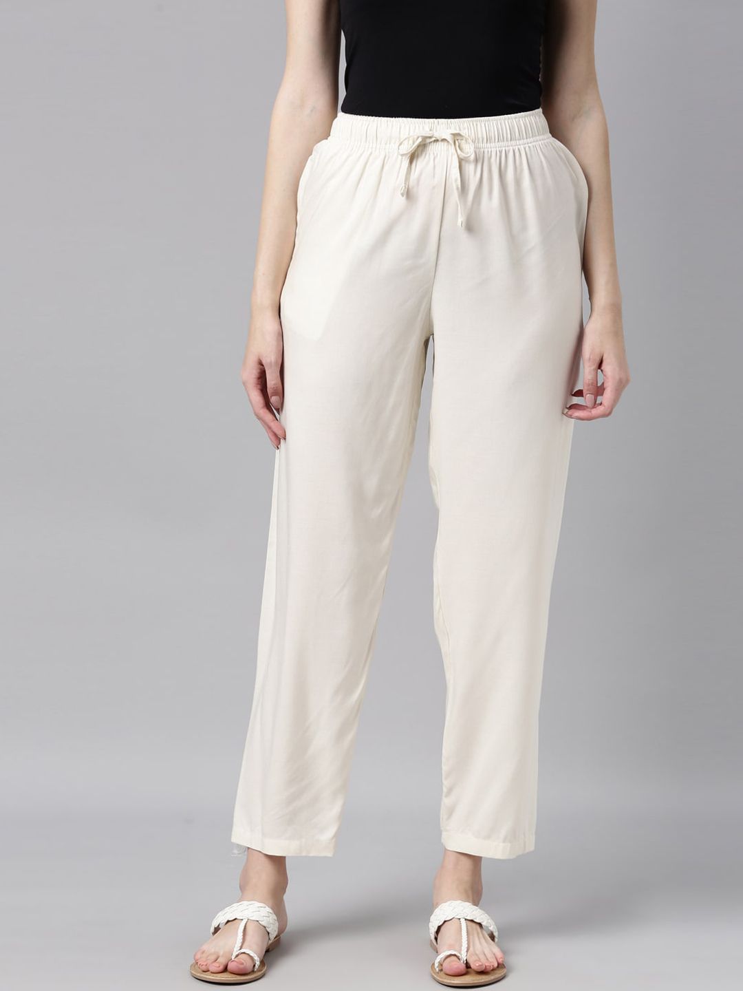 Go Colors Women Beige Trousers Price in India