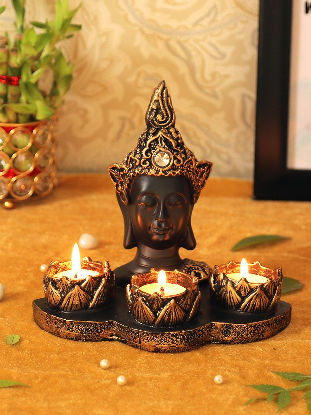 TIED RIBBONS Black & Bronze-Toned Buddha Candle Holder Showpiece Price in India