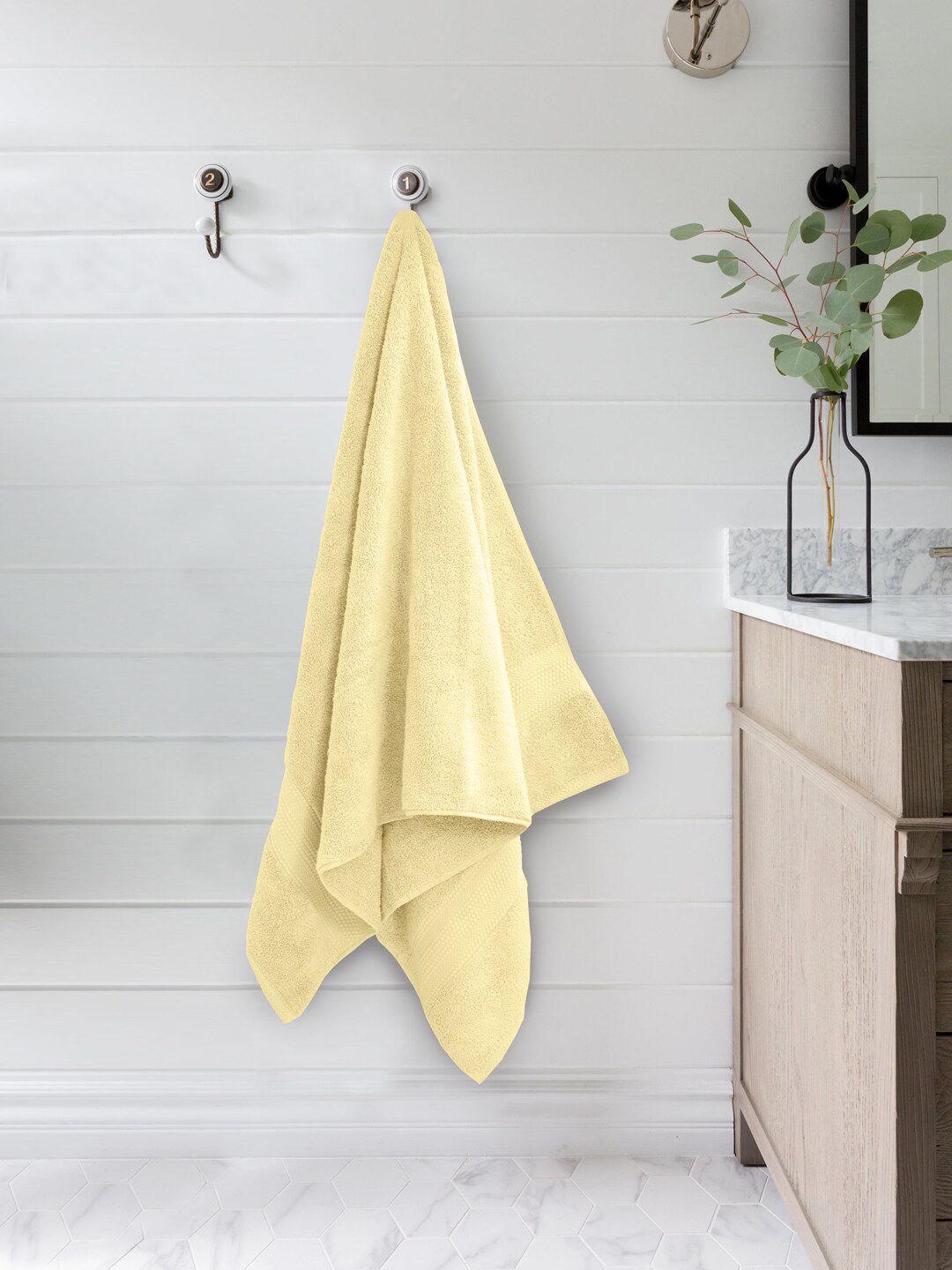BOMBAY DYEING Yellow Solid 650 GSM Cotton Bath Towel Price in India