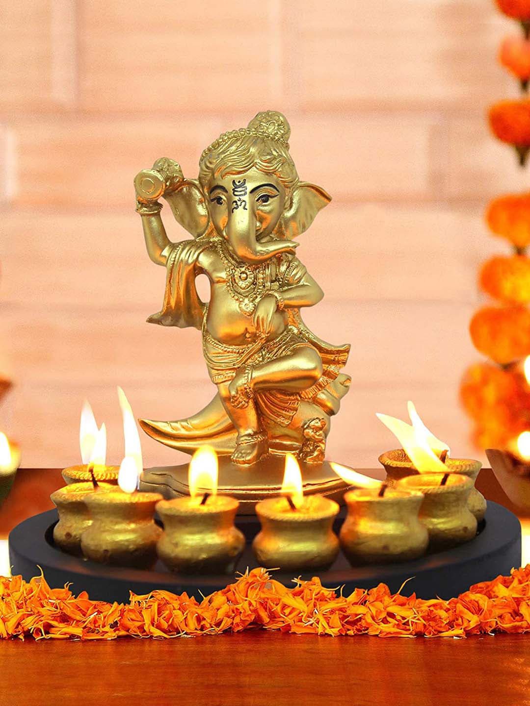 TIED RIBBONS Gold-Toned & Brown Ganesha Idol with Tray & Tealight Candles Showpiece Price in India