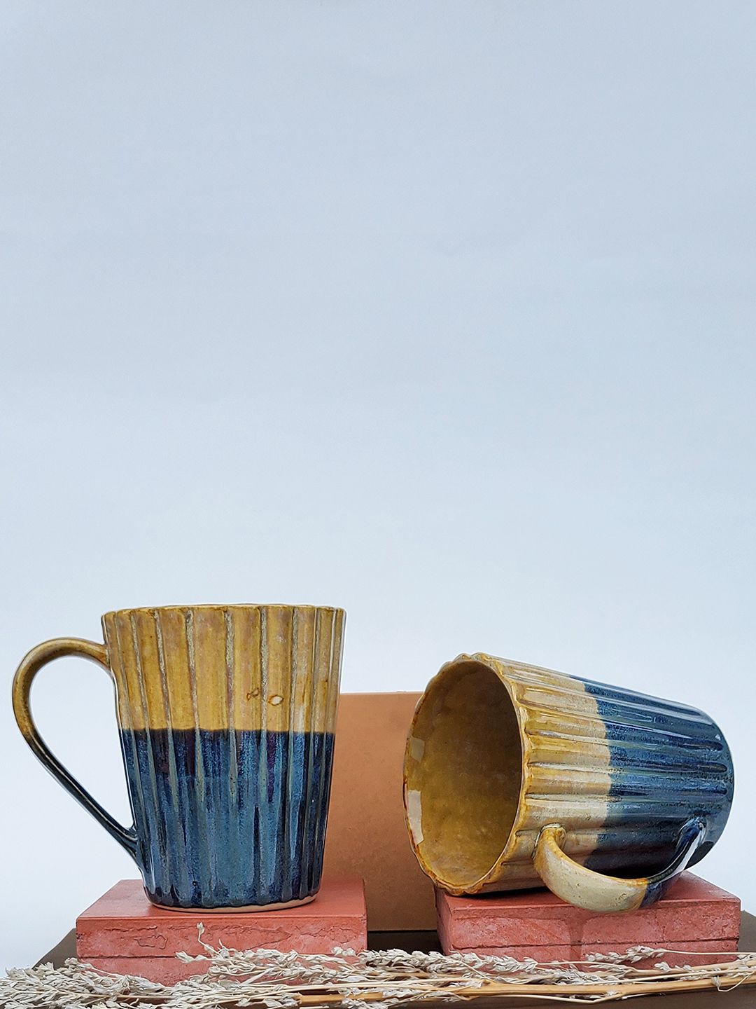 Folkstorys Set Of 2 Yellow & Navy Blue Handcrafted Textured Ceramic Glossy Mugs Price in India