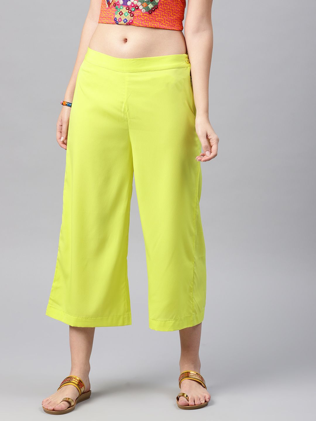 W Women Lime Green Solid Cropped Trousers Price in India
