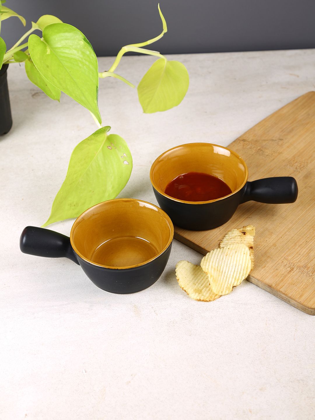Aapno Rajasthan Black & Mustard 2 Pieces Ceramic Glossy Bowls Price in India