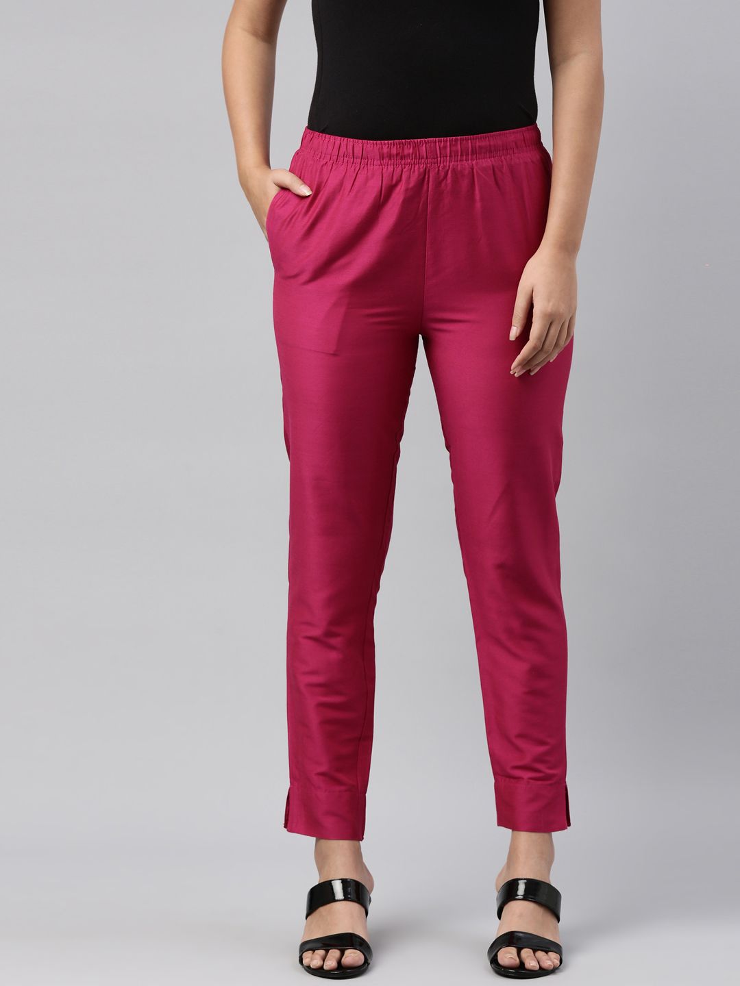 Go Colors Women Pink Peg Trousers Price in India