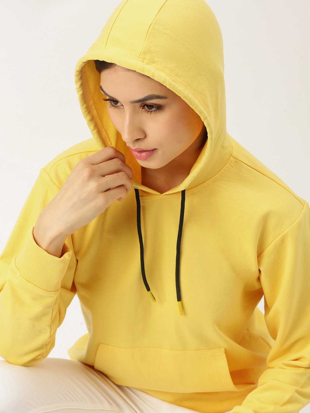 FOREVER 21 Women Yellow Solid Hooded Pullover Sweatshirt Price in India