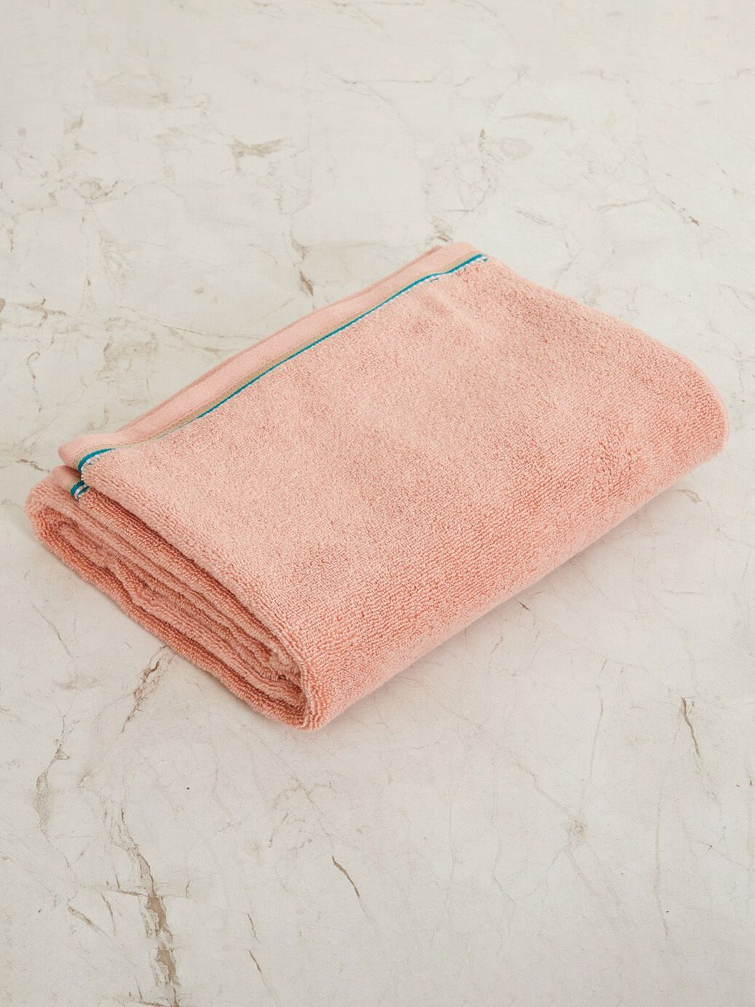 Home Centre Peach Colored Solid Cotton 110 GSM Bath Towel Price in India