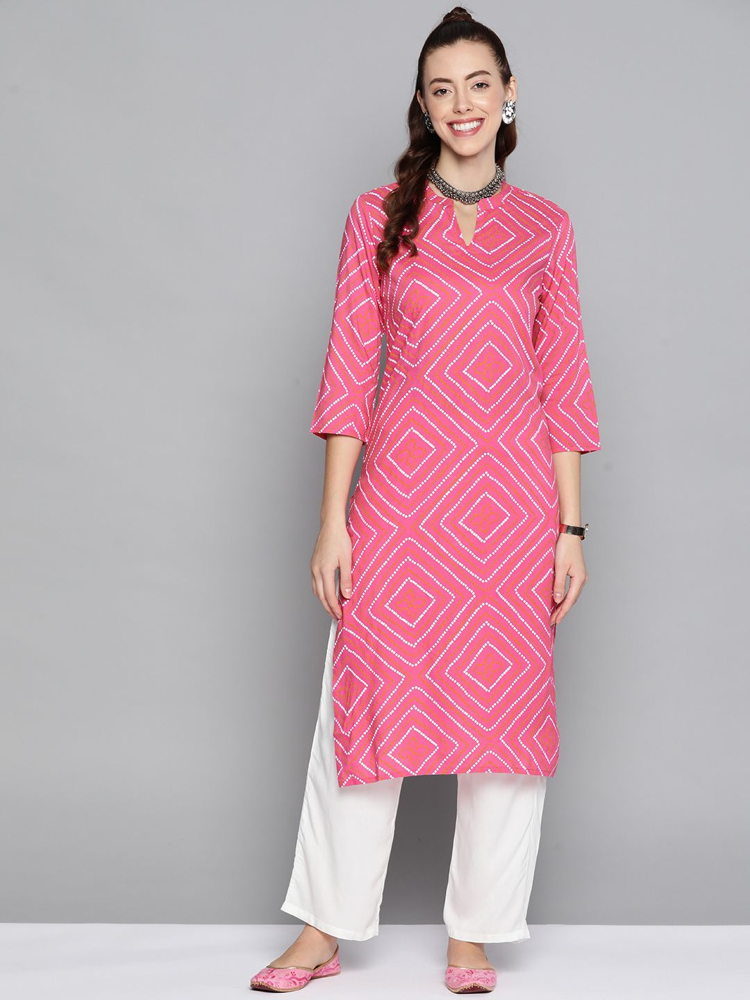 HERE&NOW Women Pink & White Bandhani Printed Regular Kurta with Trousers Price in India