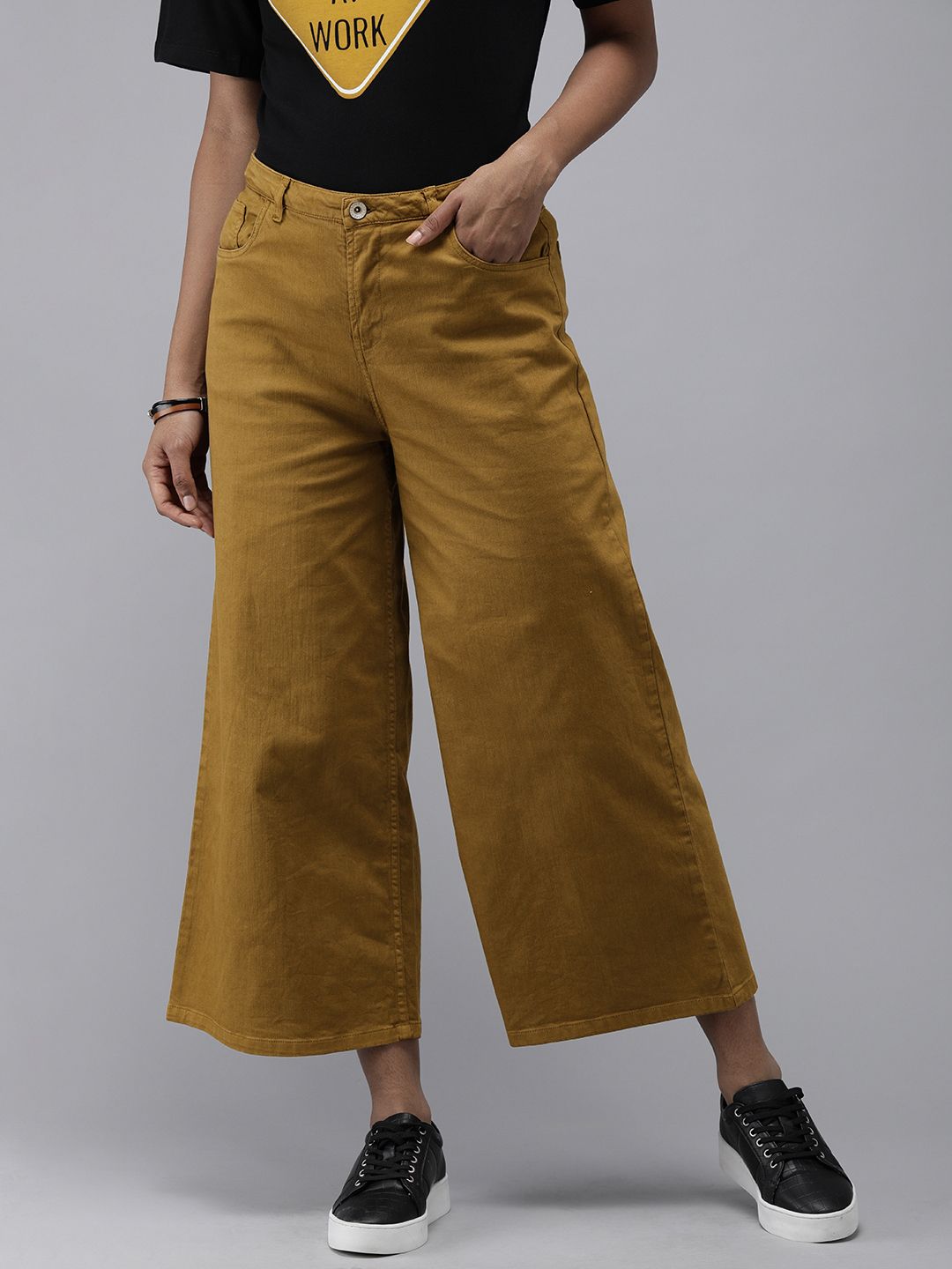 Roadster Women Brown Solid Flared Fit Regular Trousers Price in India