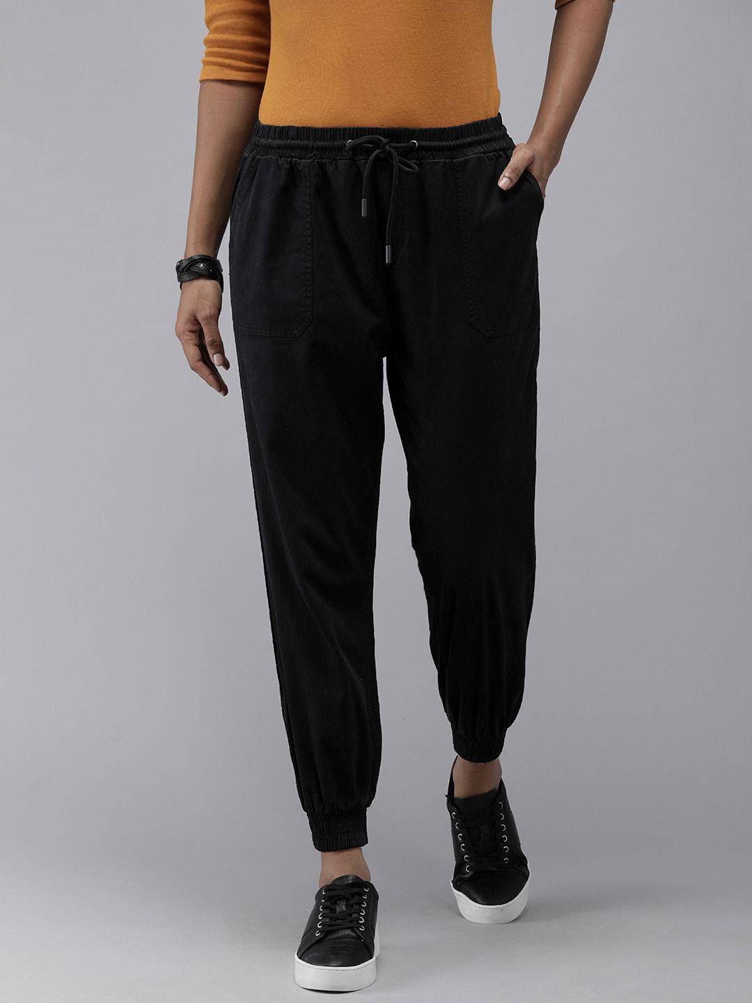 Roadster Women Black Solid Jogger Trousers Price in India