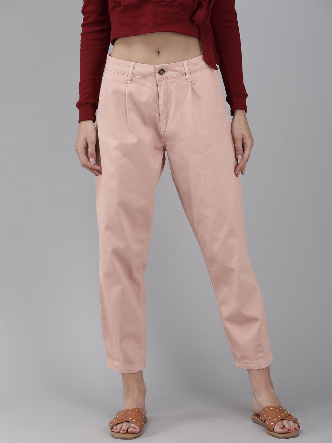 The Roadster Lifestyle Co Women Peach-Coloured Printed Slouchy Fit Cropped Trousers Price in India