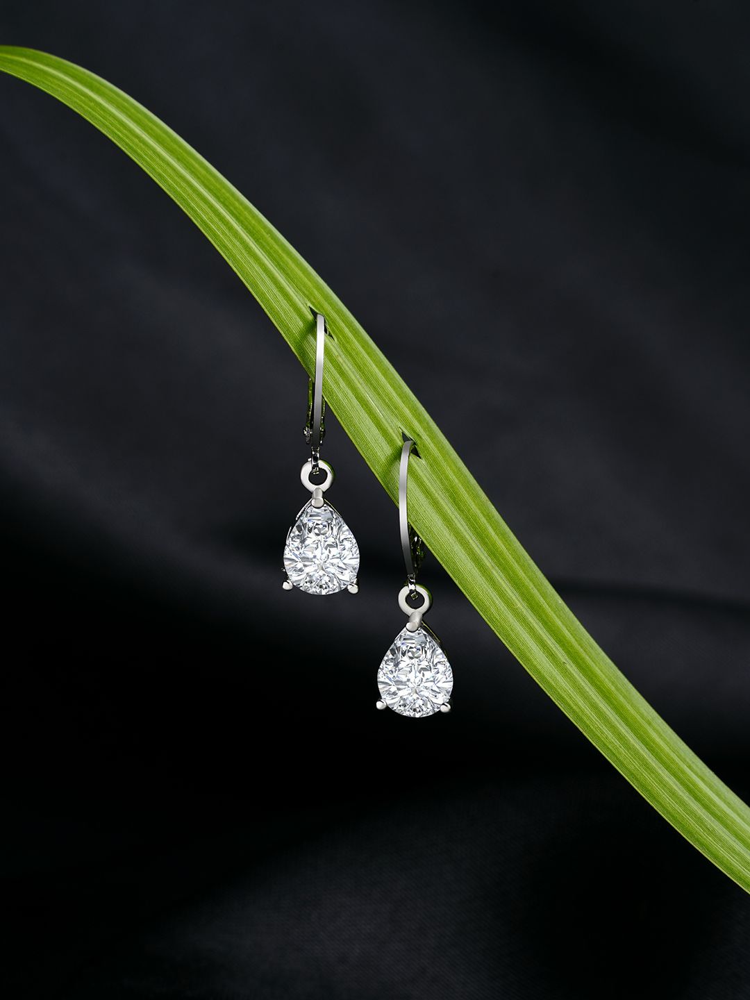 AMI Silver-Toned Contemporary Drop Earrings Price in India