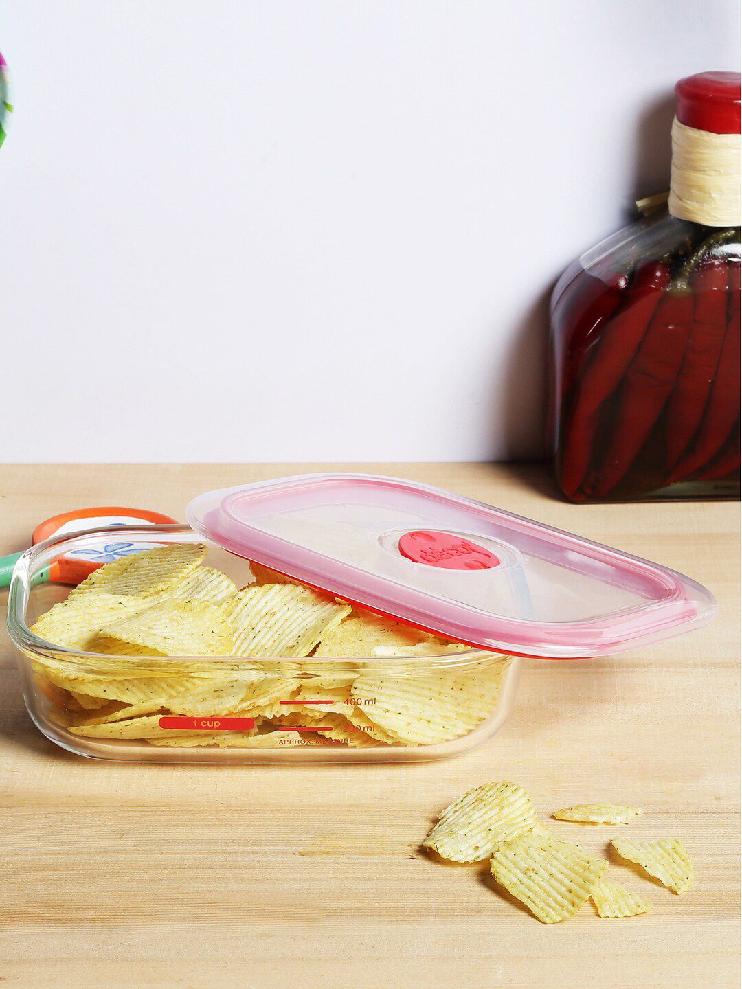 Decor Transparent & Red Solid Rectangular Food Storage Container With Lid Price in India