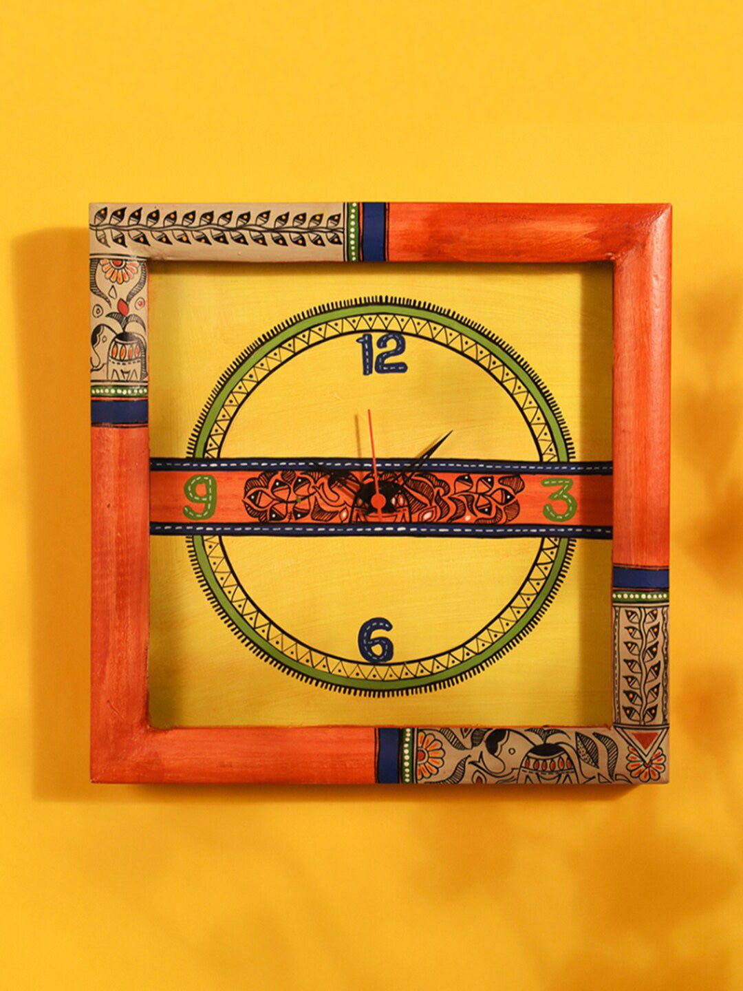 AAKRITI ART CREATIONS Orange & Yellow Madhubani Art Printed Square Analogue Wall Clock Price in India