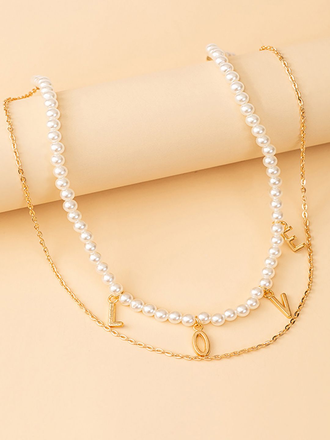 URBANIC Gold-Toned & White Beaded Layered Necklace Price in India