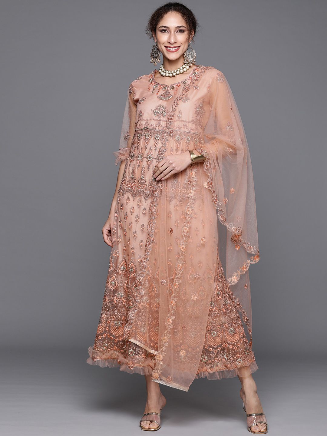 Chhabra 555 Peach-Coloured & Golden Embroidered Semi-Stitched Dress Material Price in India