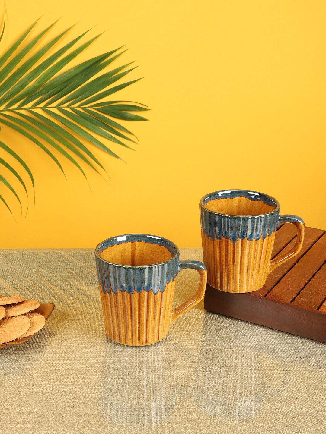 AAKRITI ART CREATIONS Set Of 2 Orange & Blue Printed Ceramic Glossy Rustic Mugs Price in India