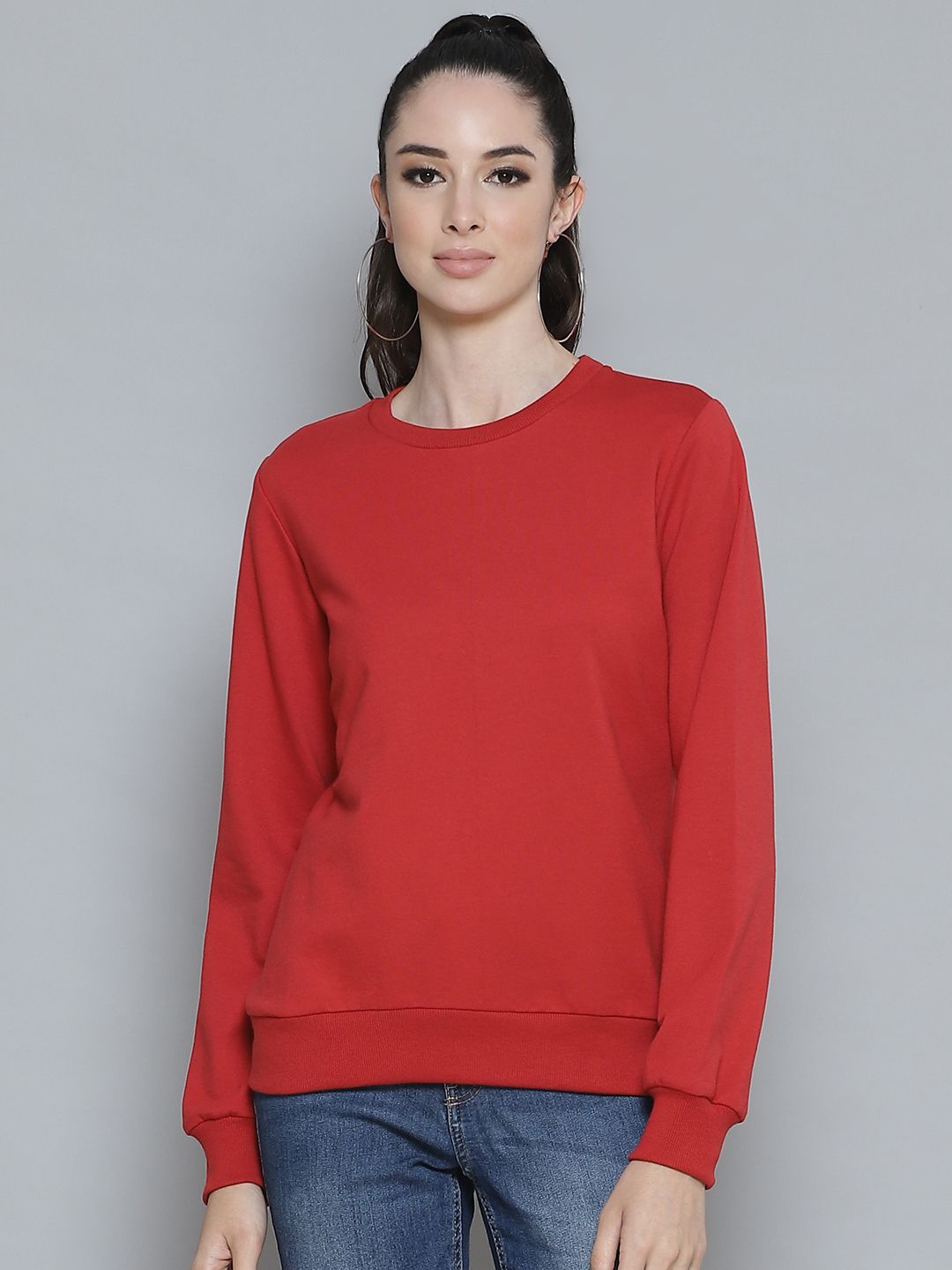 Femella Women Red Solid Sweatshirt Price in India