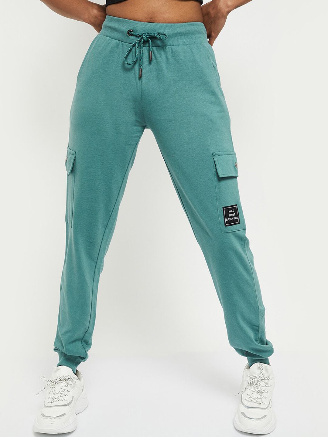 max Women Green Solid Pure Cotton Joggers Price in India