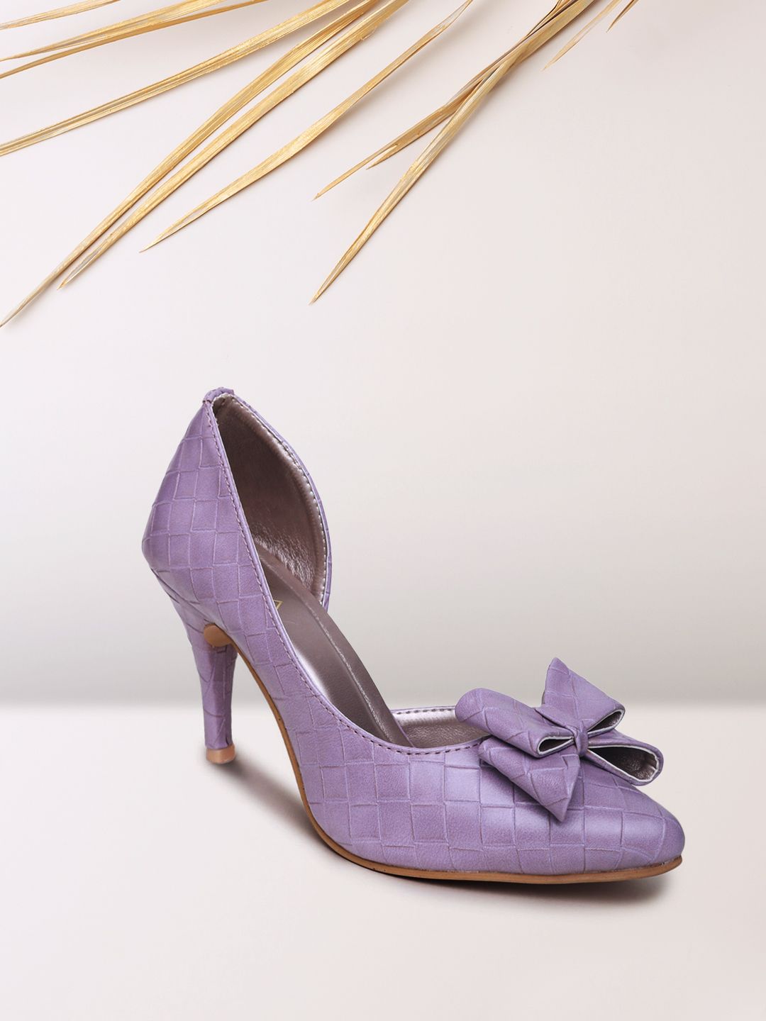 VALIOSAA Purple Textured Pumps with Bows Price in India