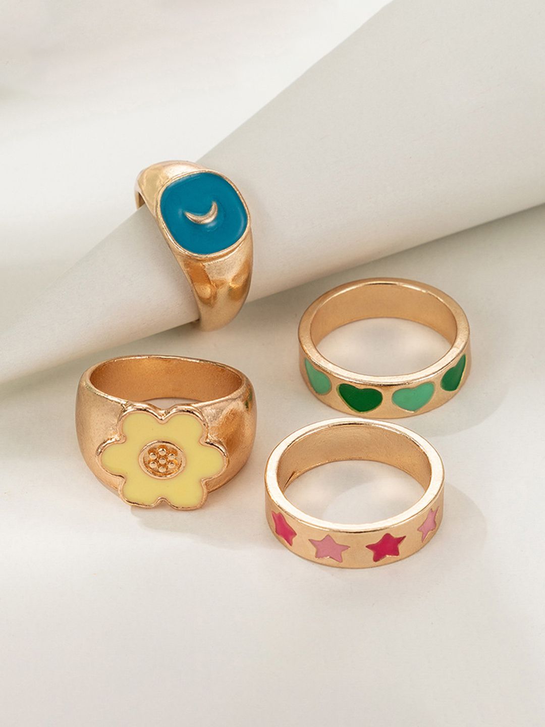 YouBella Set Of 4 Alloy Gold-Plated Enamelled Finger Rings Price in India