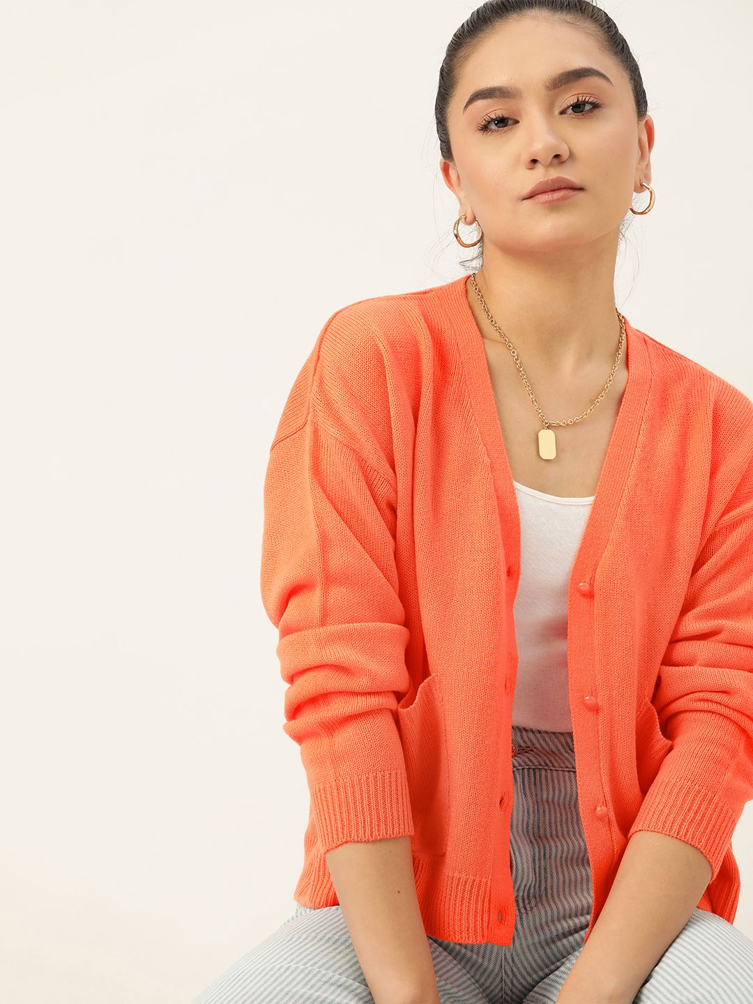 DressBerry Women Peach-Coloured Solid Cardigan Price in India