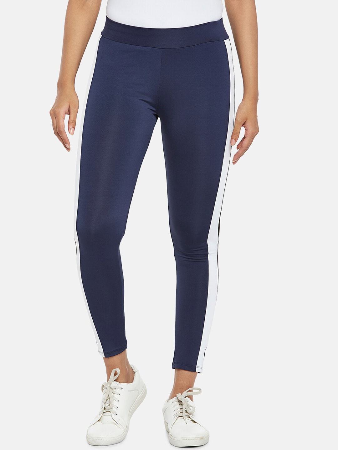 People Women Blue Solid Track Pants Price in India