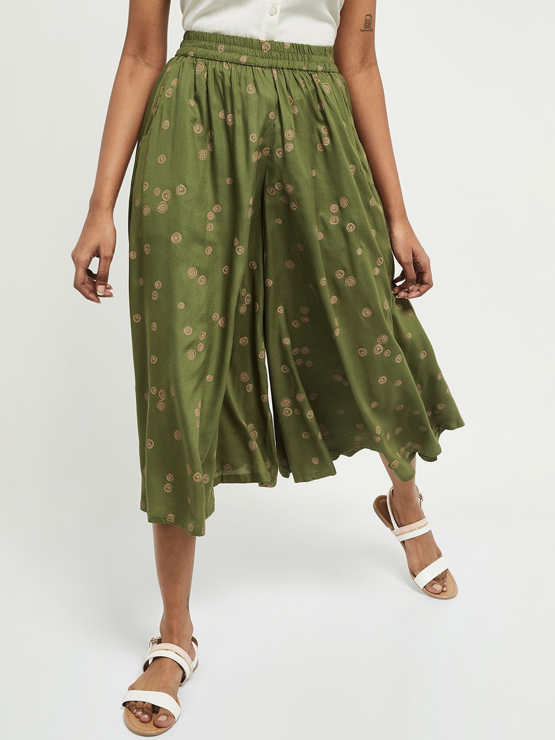 max Women Green Printed Loose Fit Pleated Culottes Trousers Price in India