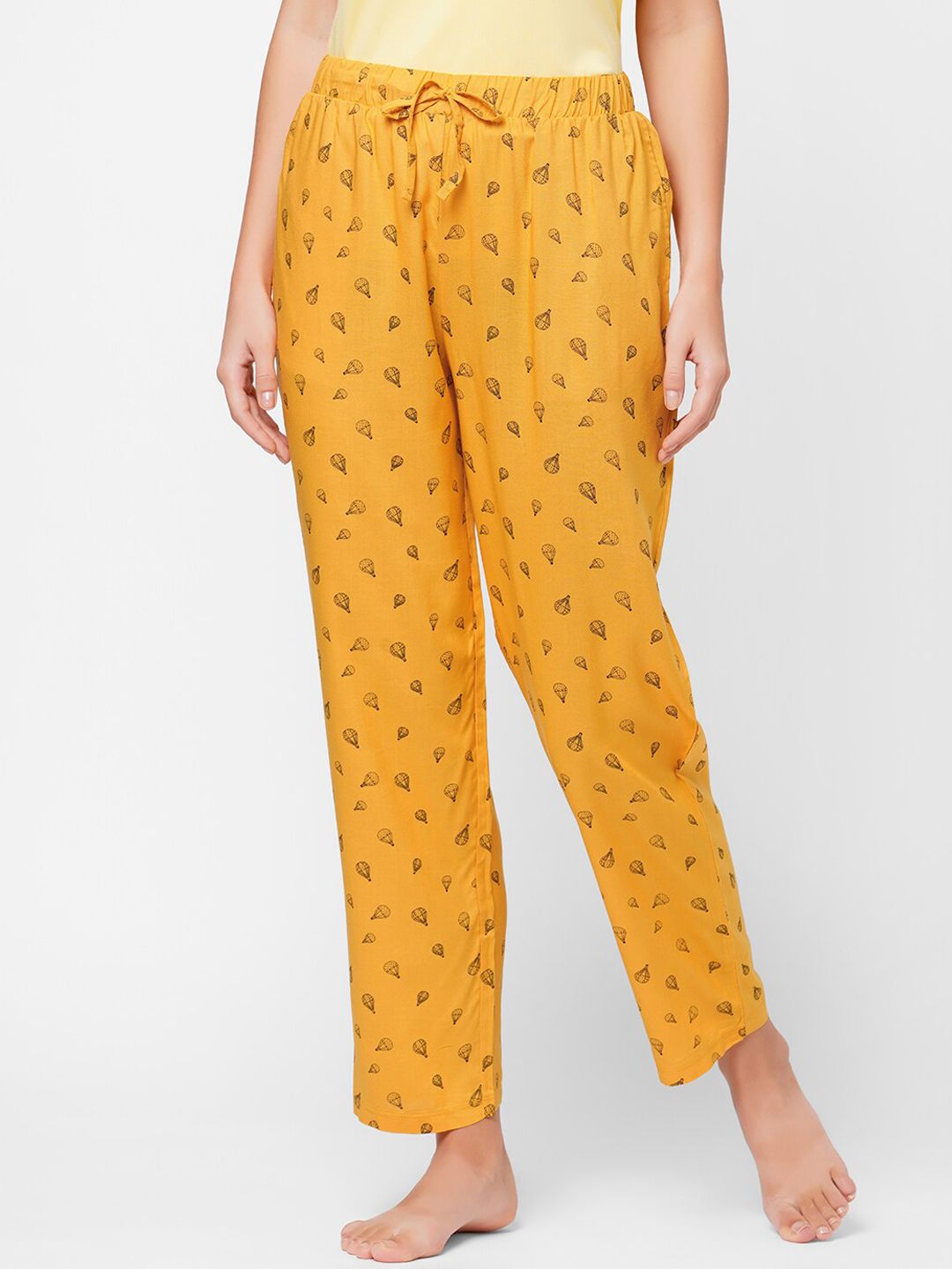 SOIE Women Mustard Super-soft Rayon printed pyjamas Price in India