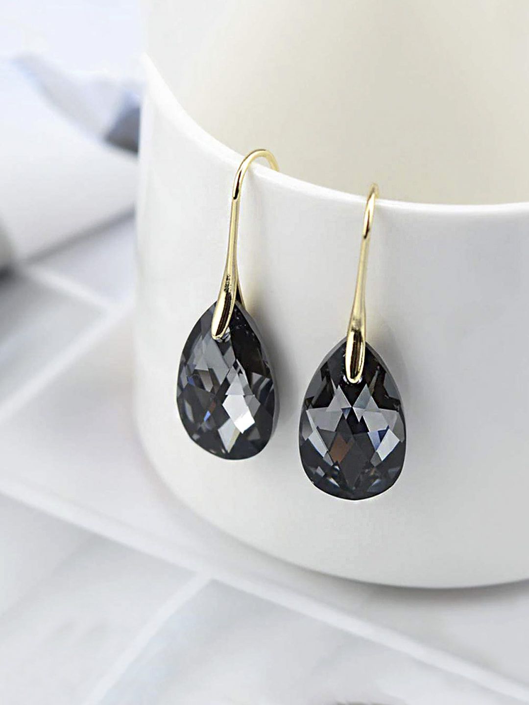 Yellow Chimes Gunmetal-Toned & Gold-Toned Teardrop Shaped Drop Earrings Price in India