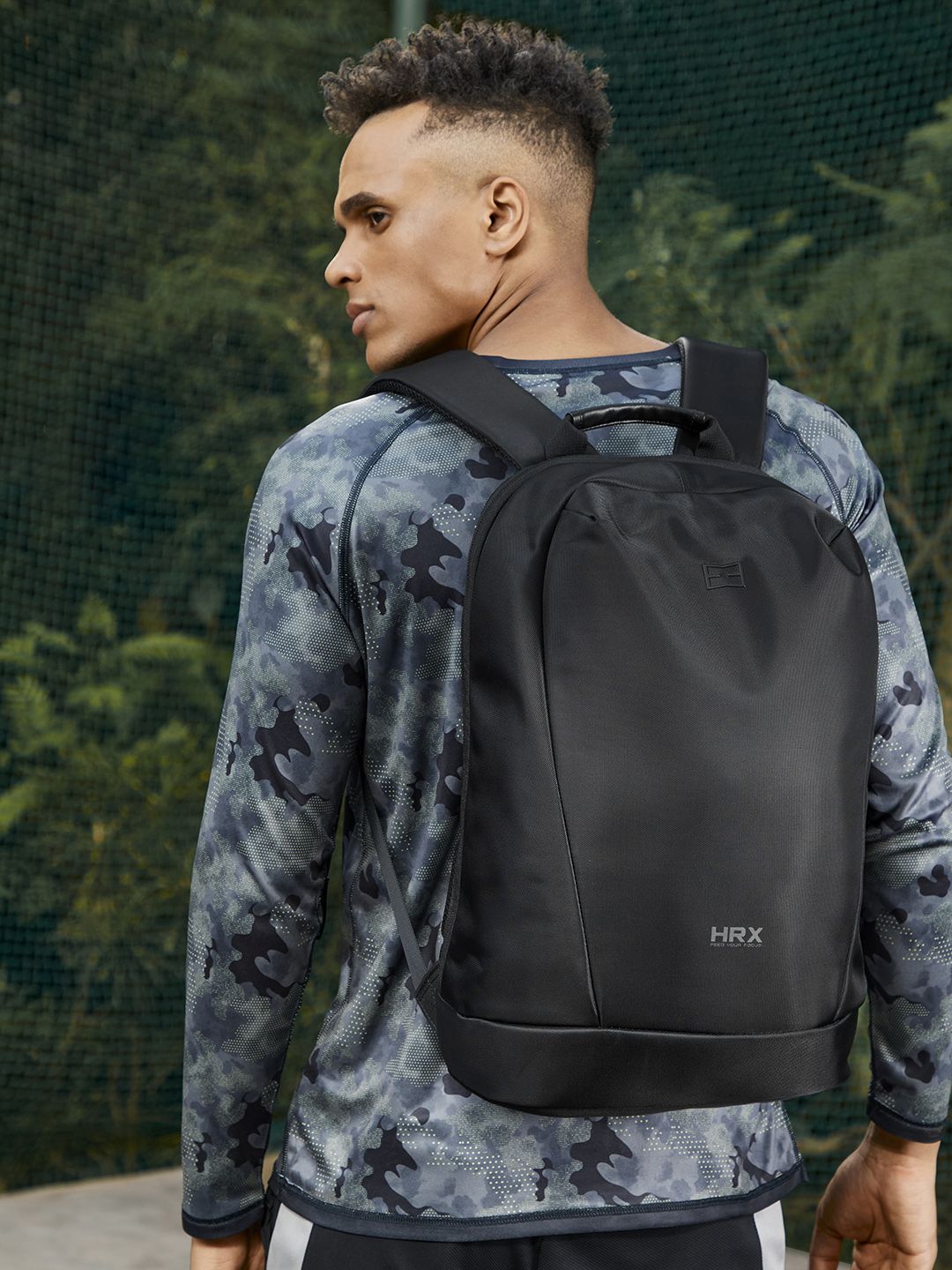 HRX by Hrithik Roshan Unisex Black Solid Backpack with USB Charging Port Price in India